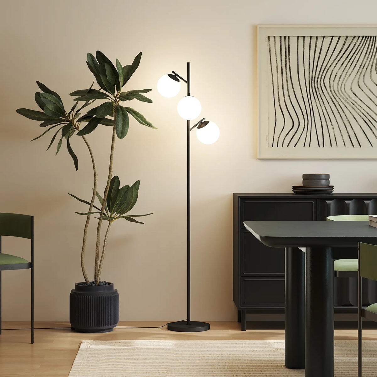 Black three-light tree floor lamp with glass globe shades