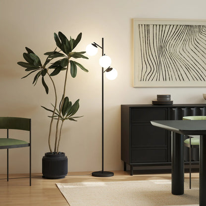 Black three-light tree floor lamp with glass globe shades