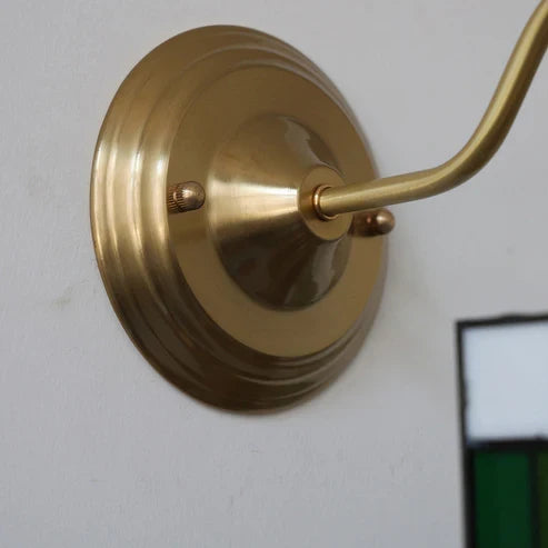 Curved wall arm and round backplate detail
