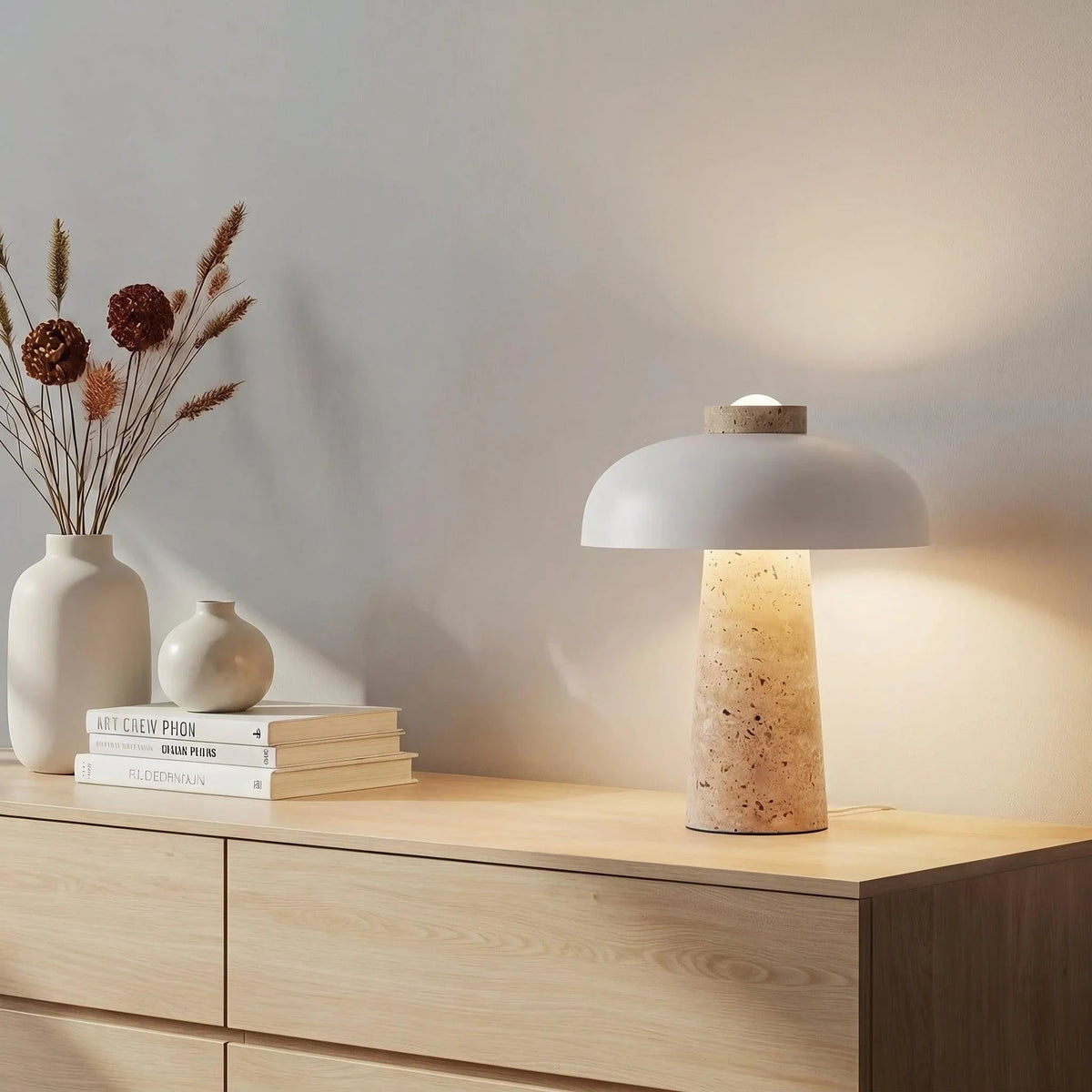 White dome travertine lamp on a console
