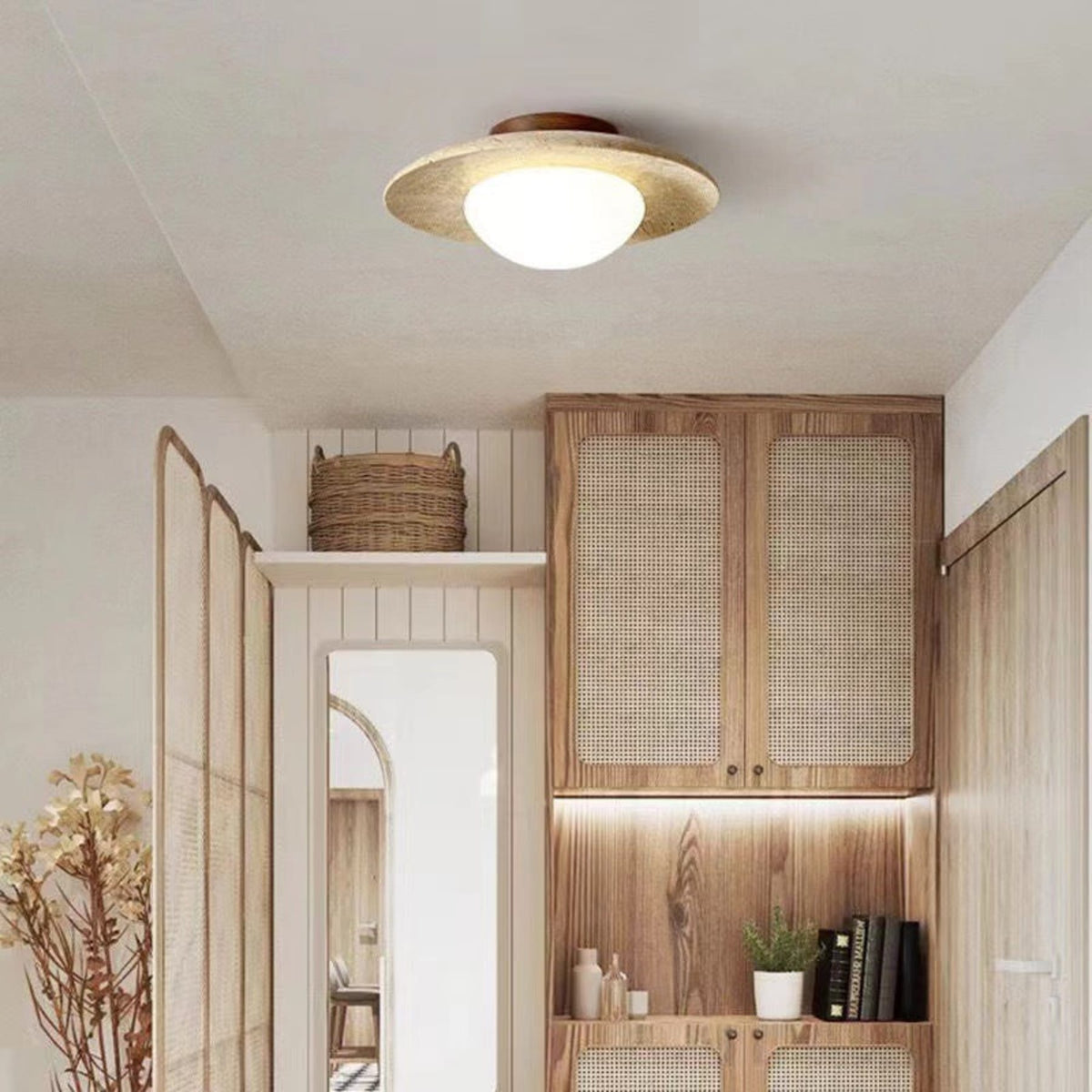 Travertine and wood ceiling light in an entryway