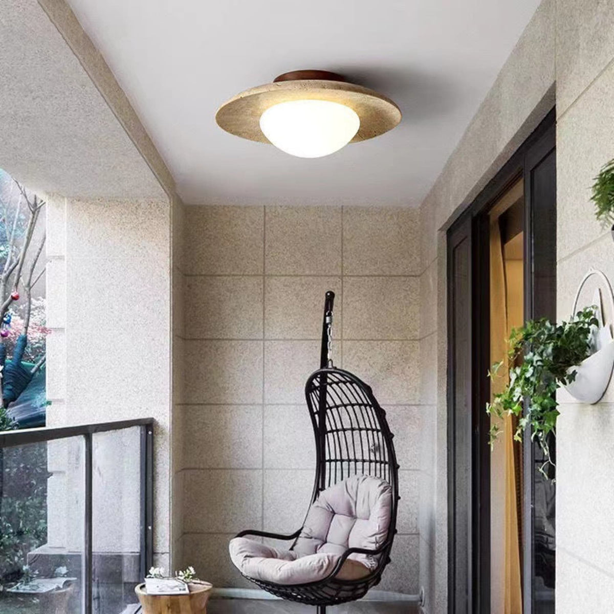 Travertine ceiling light in an enclosed balcony setting