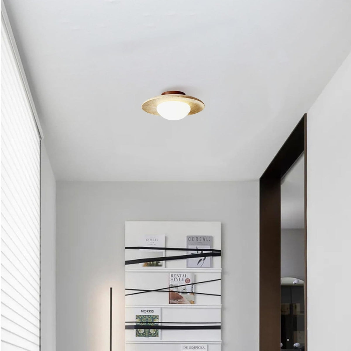 Travertine saucer ceiling light in a hallway