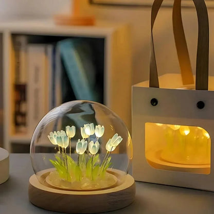 Blue tulip night light beside a gift bag