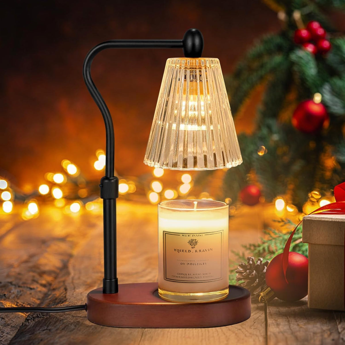 Vintage glass candle warmer lamp with a black adjustable arm warming a jar candle