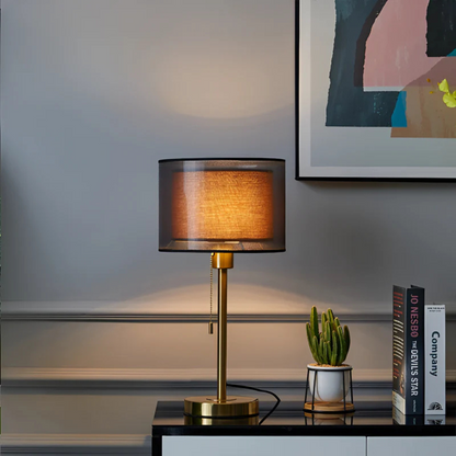 Bronze vintage table lamp with a double dark fabric shade and warm white light