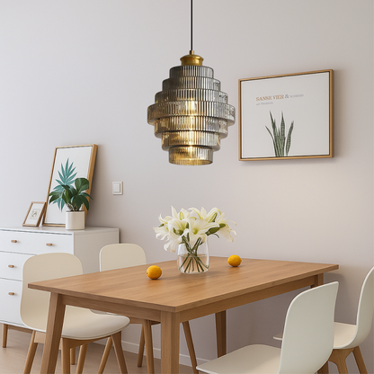 Smoky grey tiered pendant above a dining table