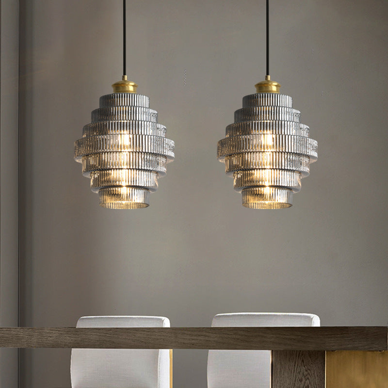 Two smoky grey tiered glass pendants