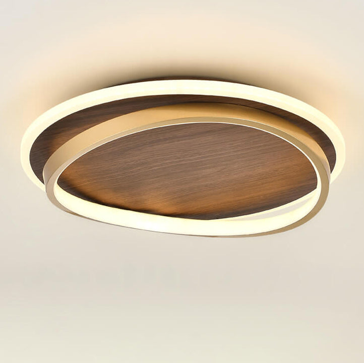Close-up of the walnut finish and gold frame in warm light