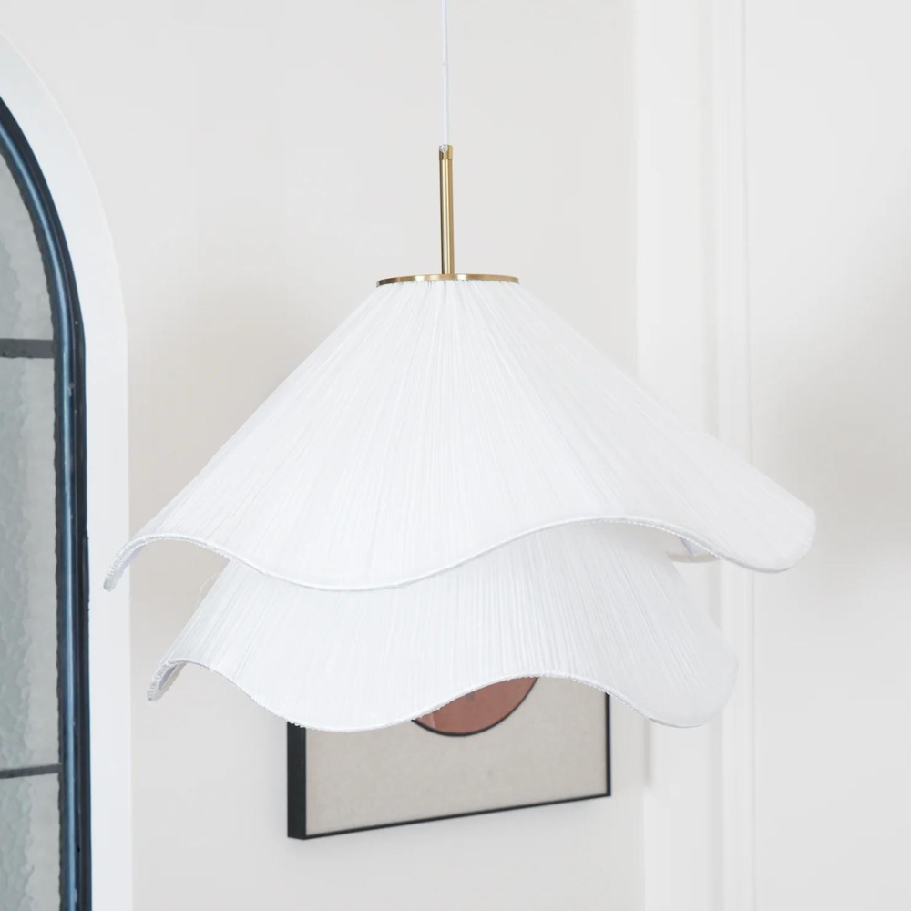 Close-up of the white wavy fabric shade