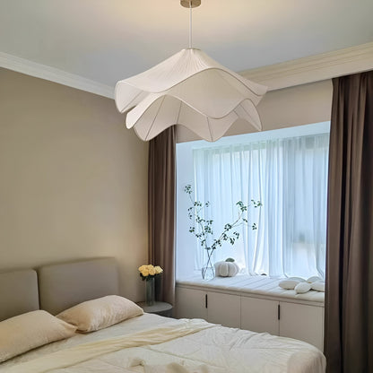 White wavy pendant in a bedroom