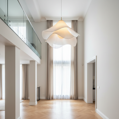 Layered fabric pendant in a tall living space