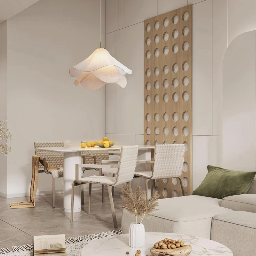 White wavy pendant in a combined dining and living space