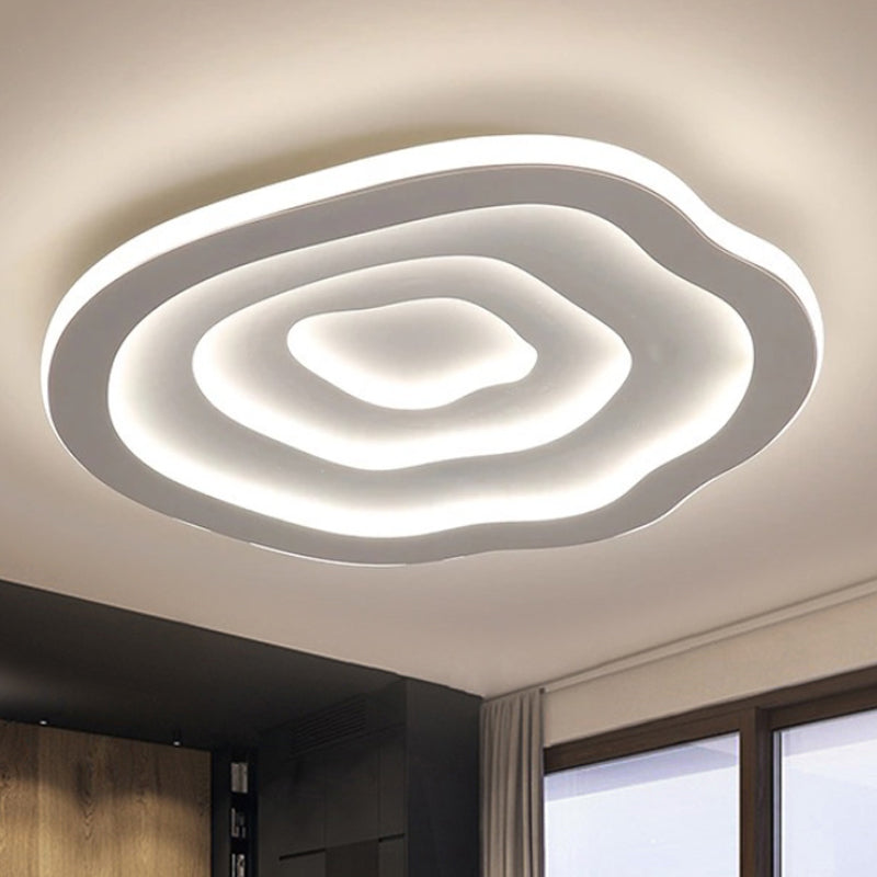 Layered ceiling light illuminated in white light