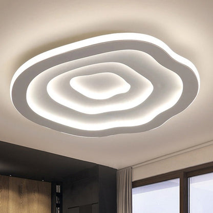 Layered ceiling light illuminated in white light
