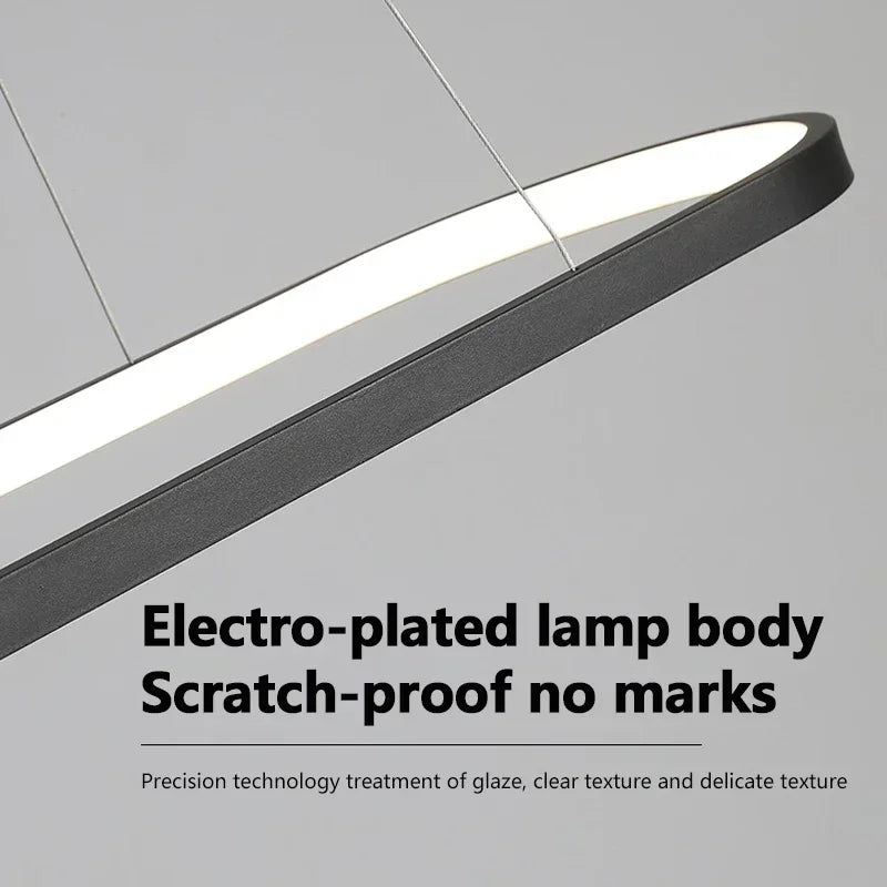 White oval pendant light in aluminium
