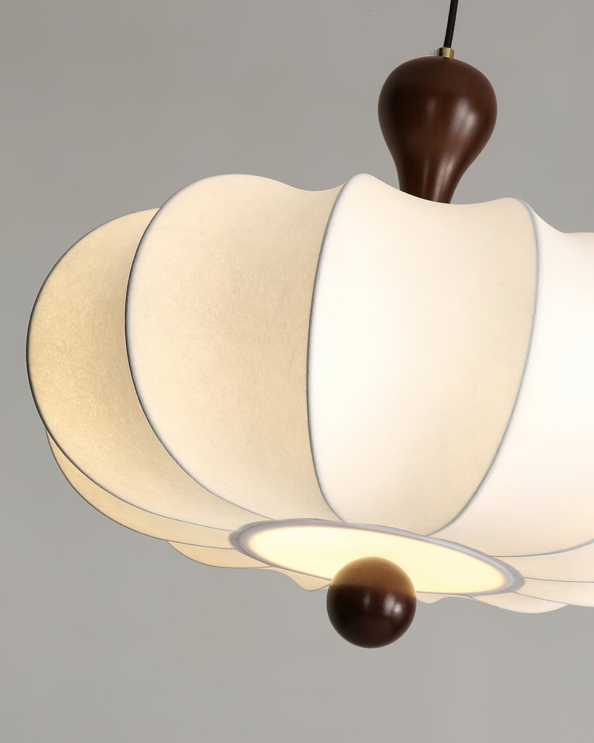 Close view of rounded white pendant panels