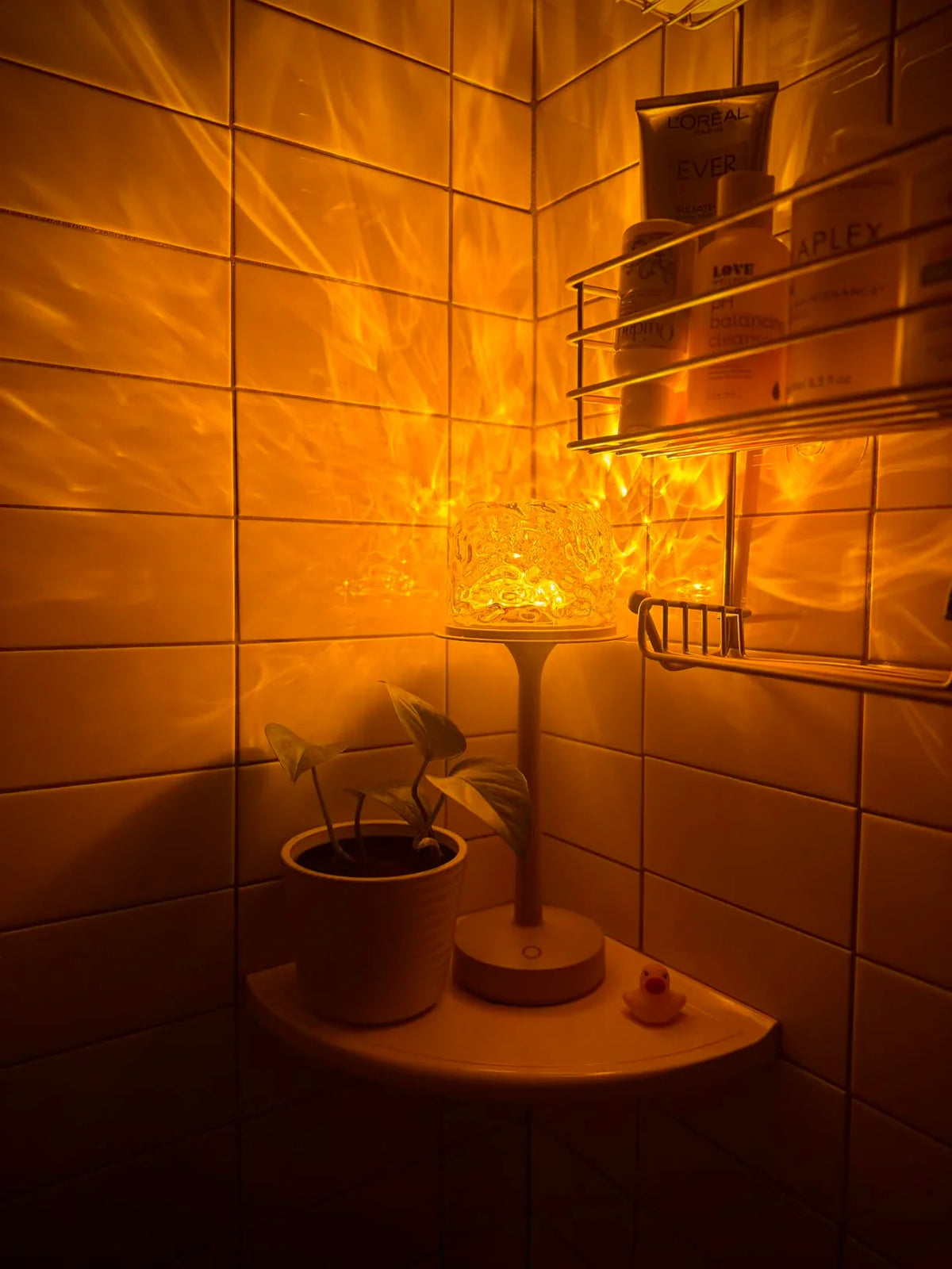 Portable aurora lamp illuminating tiled walls