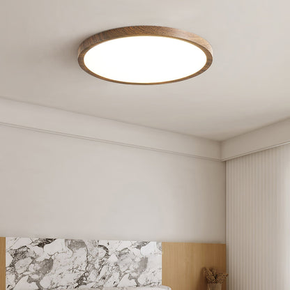 Wood-effect acrylic ceiling light in an interior