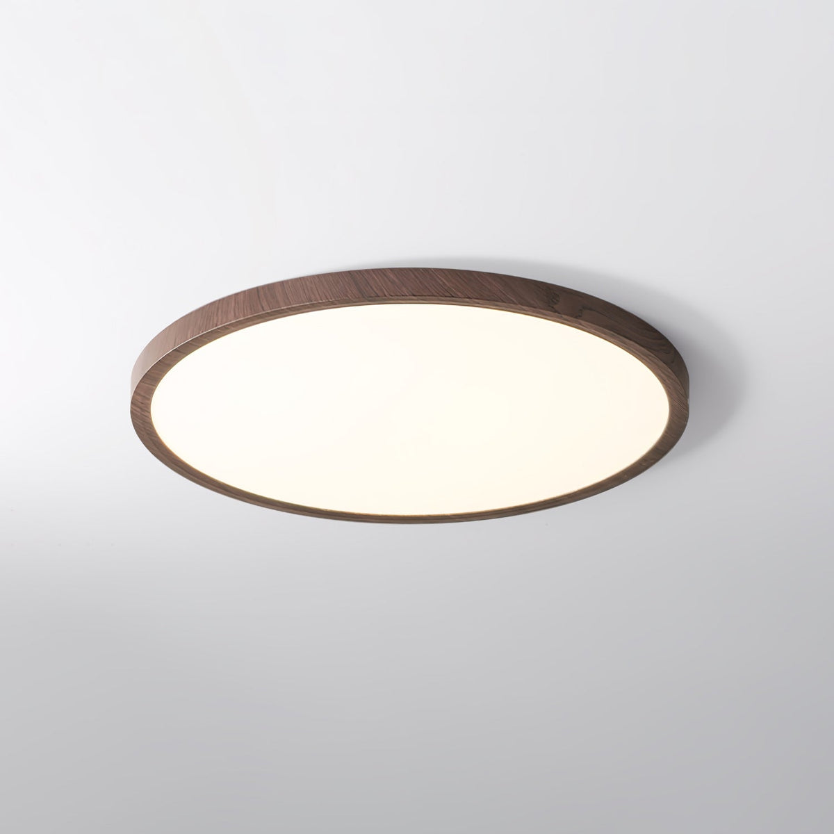 Wood-effect round acrylic flush ceiling light showing the rim and diffuser