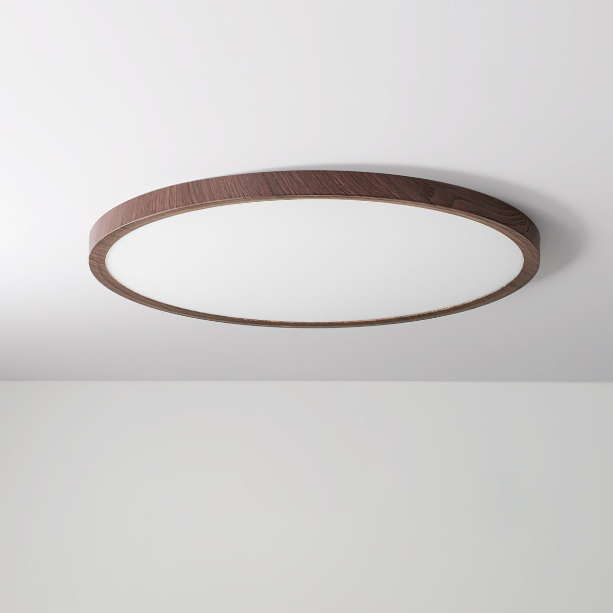 Wood-effect round acrylic flush ceiling light showing the rim and diffuser
