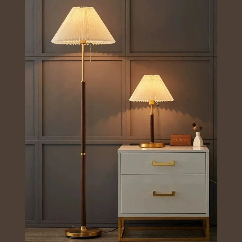 Wood-grain floor lamp and matching table lamp in a room