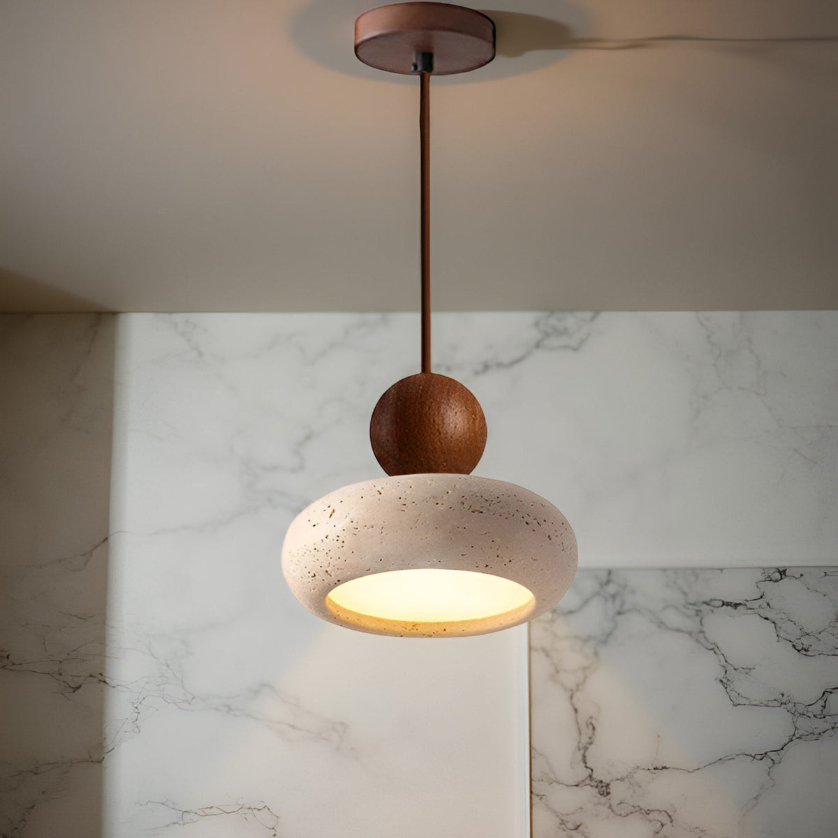 Walnut and travertine pendant in a kitchen